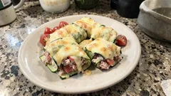 Raviolis de zapallo italiano con atún y tomate: livianos, jugosos y al horno
